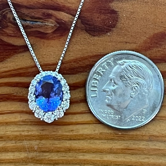 1.30 genuine tanzanite with diamond halo necklace